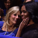 Jill Biden, wife of Vice President Joe Biden, and first lady Michelle Obama hug as President Barack Obama speaks during his farewell address in Chicago on Jan. 10, 2017.
NICHOLAS KAMM/AFP/Getty Images